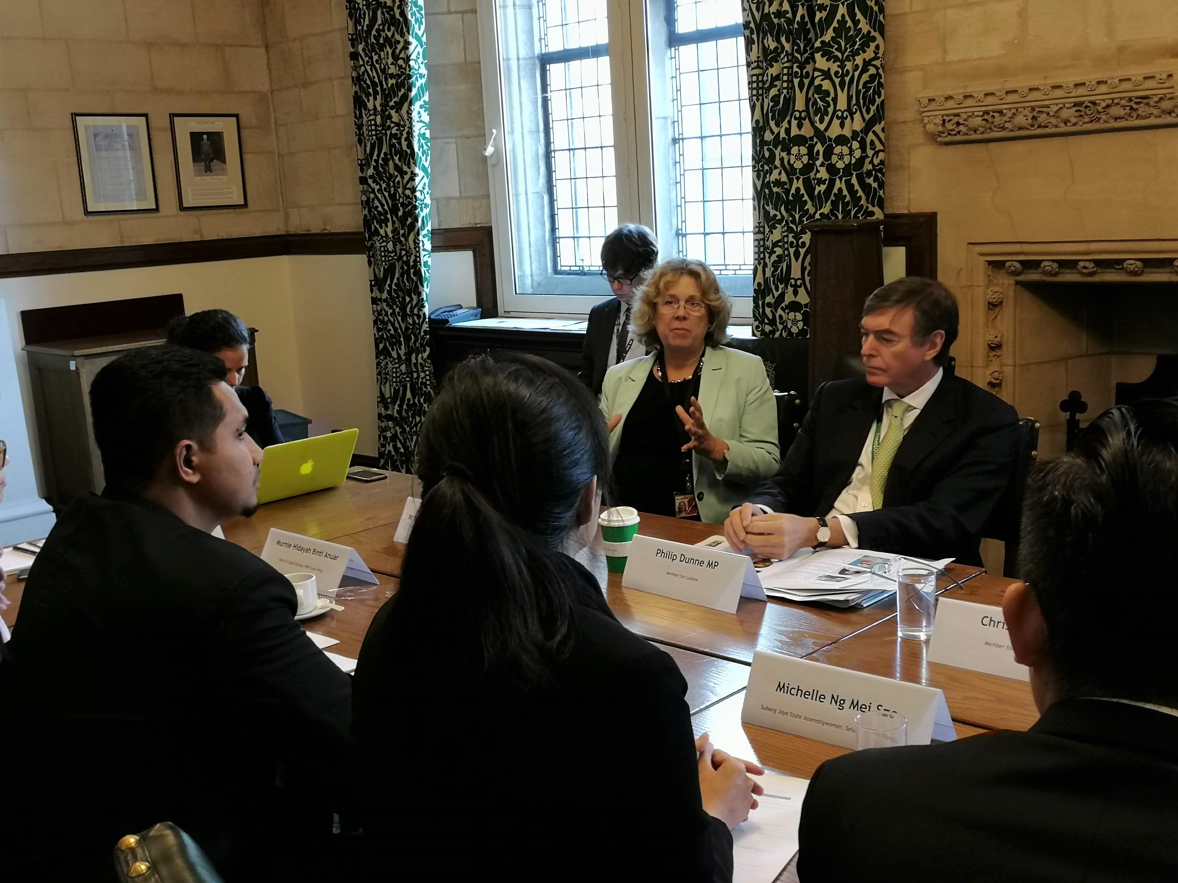The Rt Hon. the Baroness Northover and Philip Dunne MP in conversation with the delegation