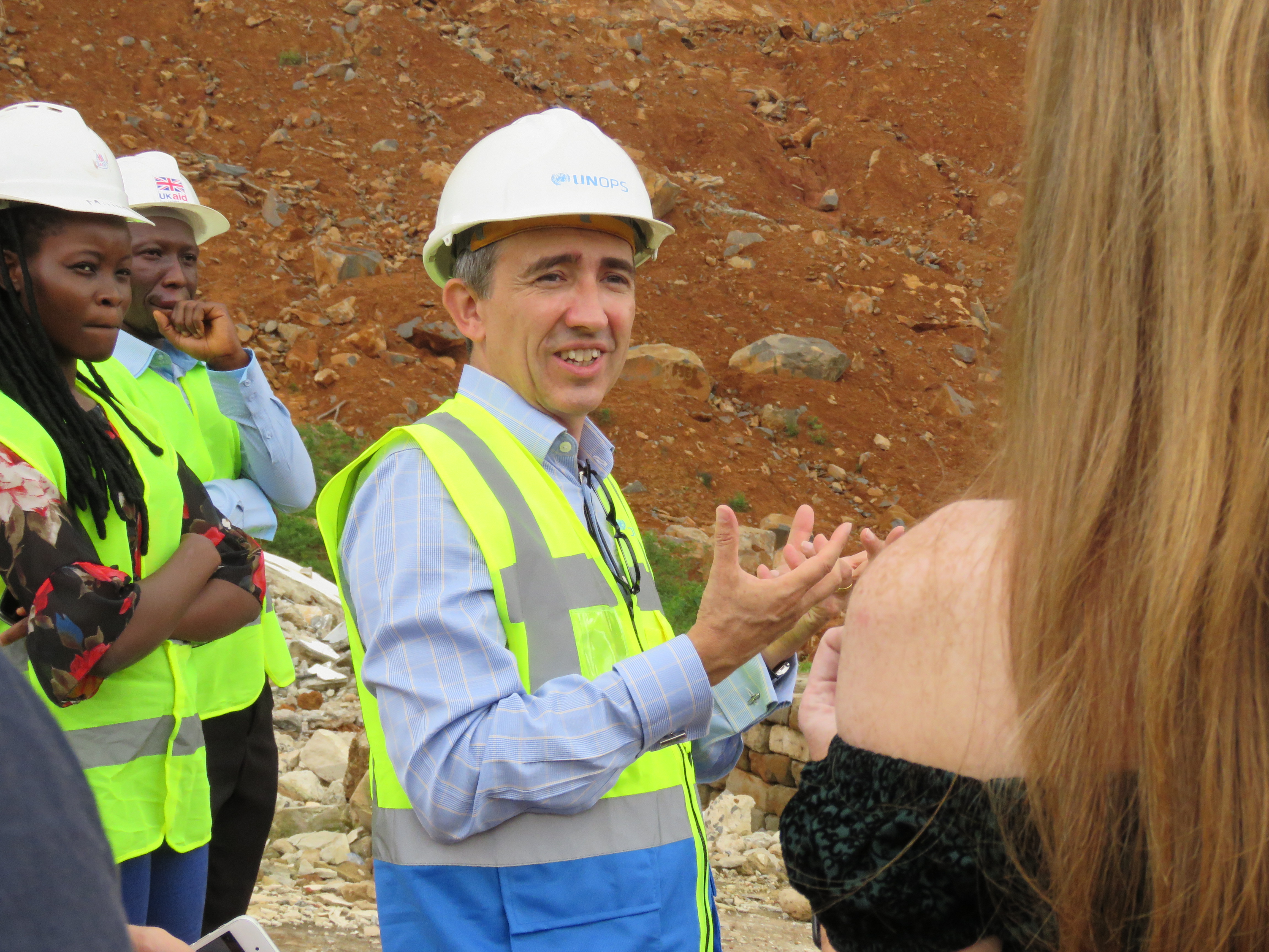 UNOPS Country Manager Nick Gardner explaining their work to stabilise the mudslide site