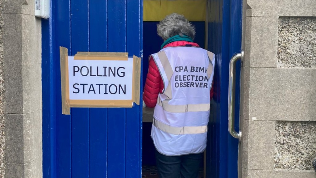 An international observer at a polling station in Garff, Isle of Man.