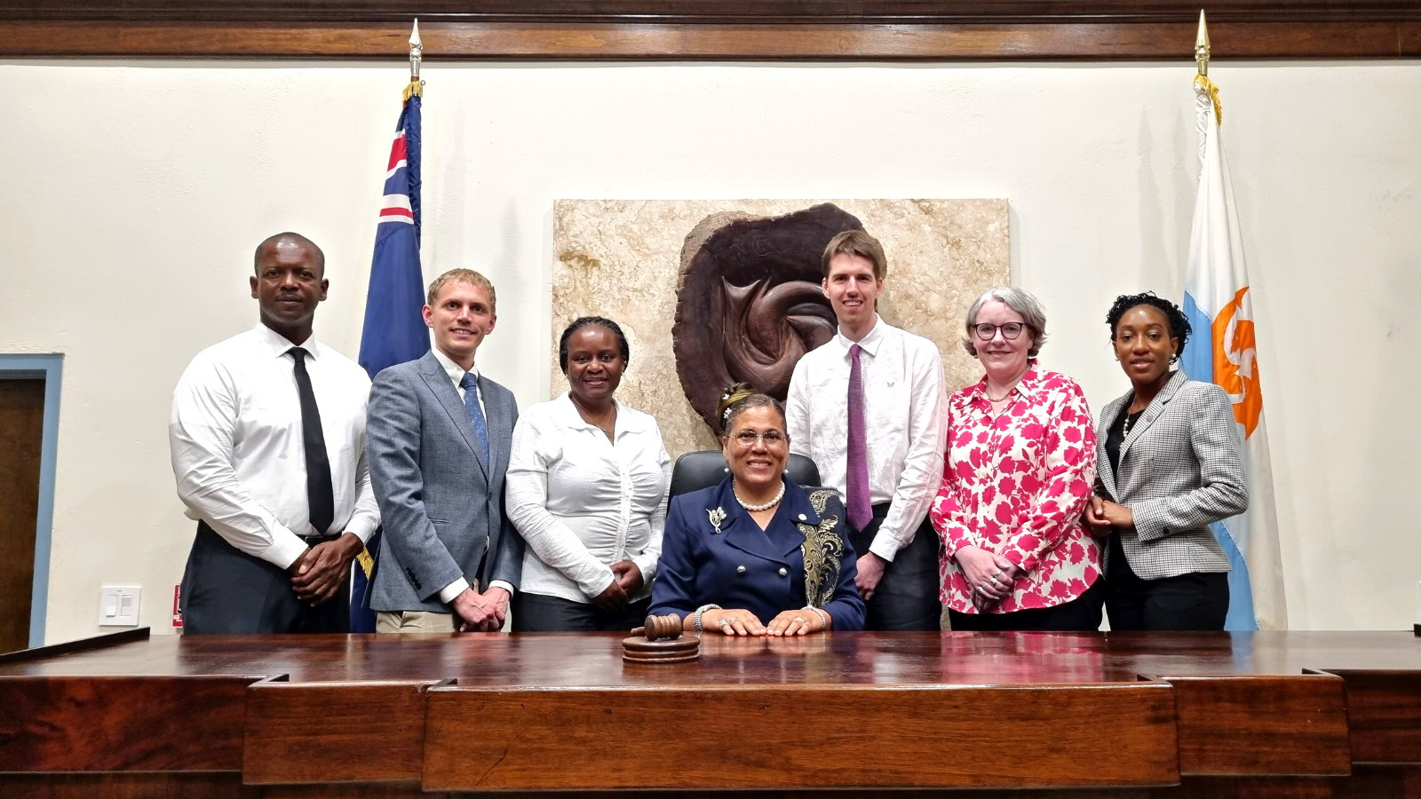 Theodore Stone stands next to the Speaker of St Helena during a Benchmarking exercise facilitated by CPA UK