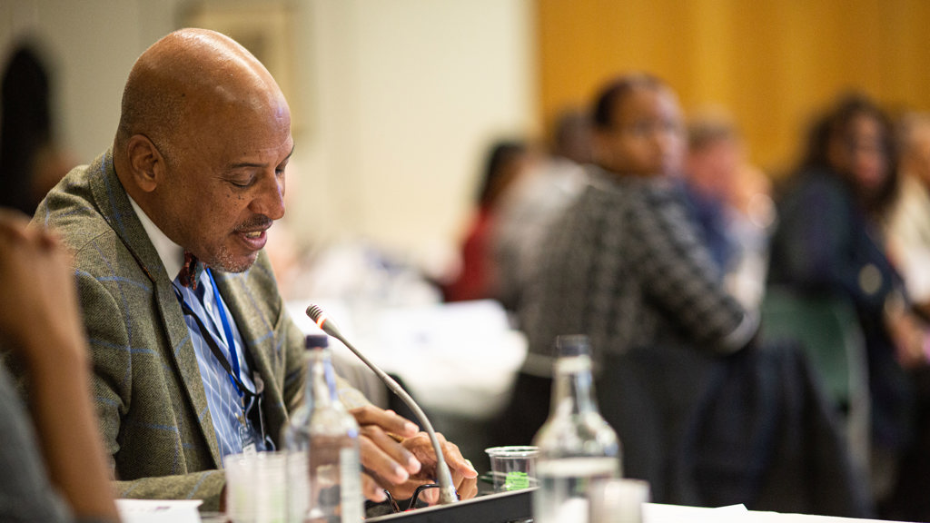 A delegate contributes to a discussion during the Overseas Territories Forum 2022.