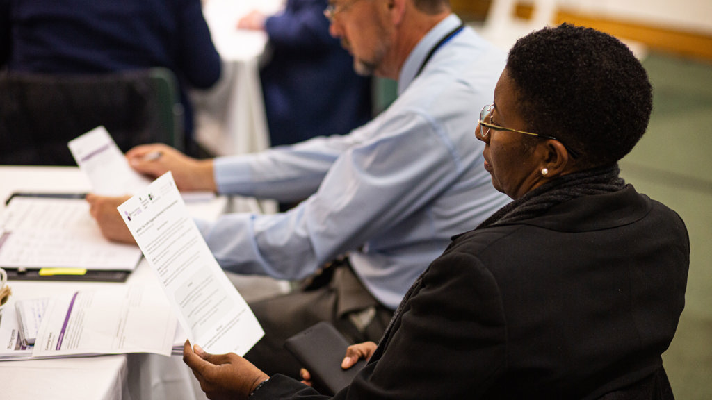 A delegate participates in a workshop during the Overseas Territories Forum 2022.