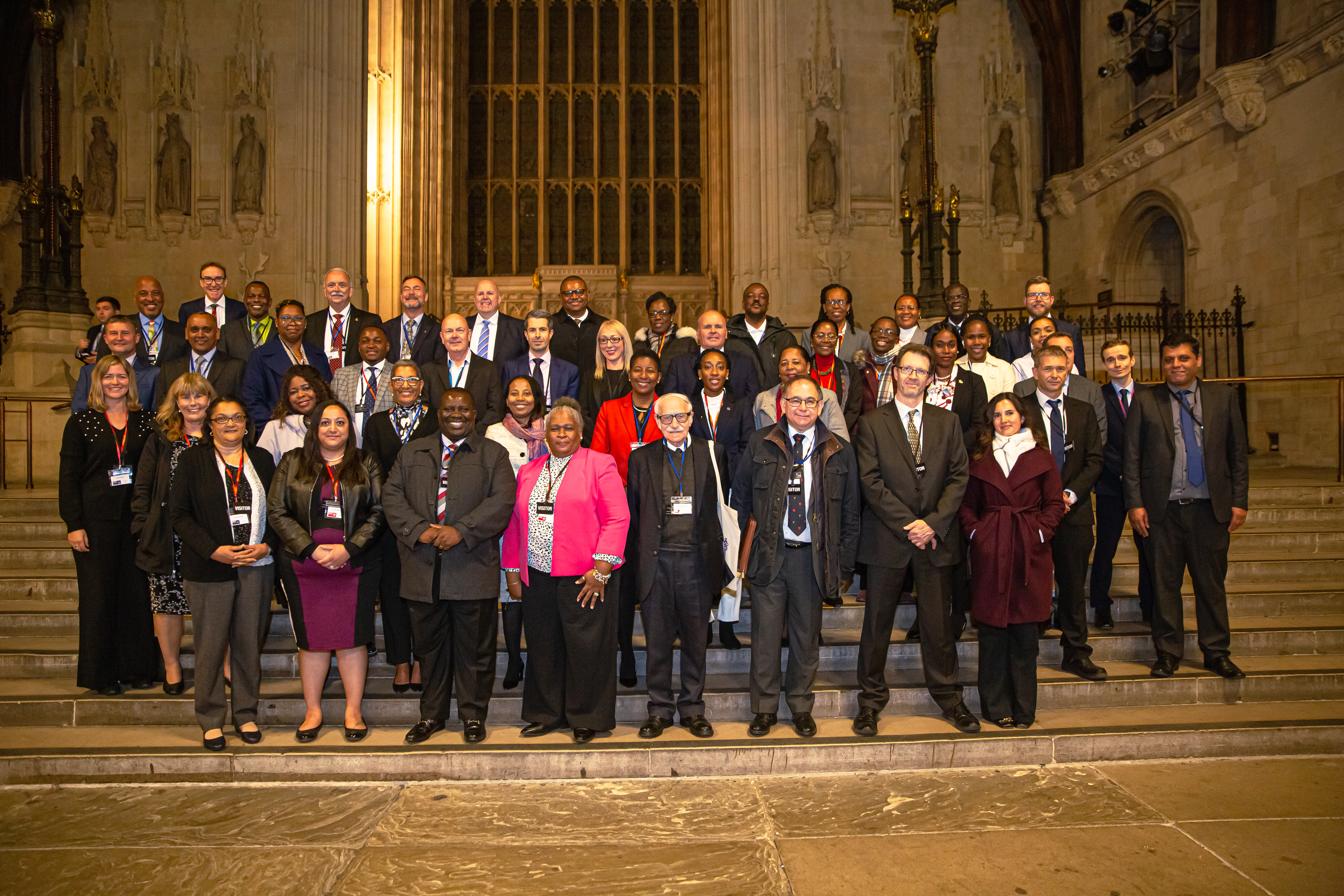 Delegates from Overseas Territories stand in Westminster Hall, UK Parliament