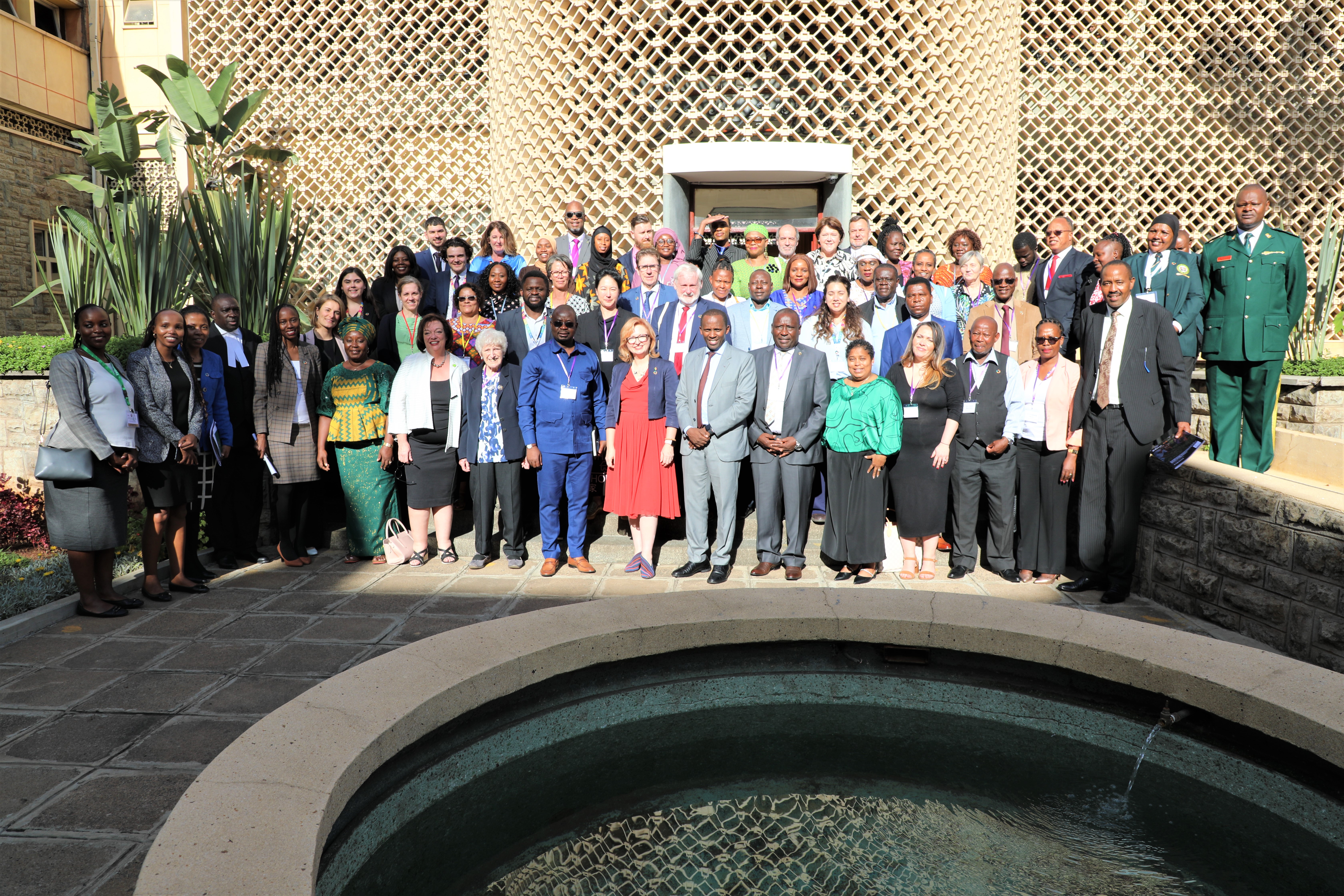 Delegates gather outside the National Assembly before visiting the Chamber