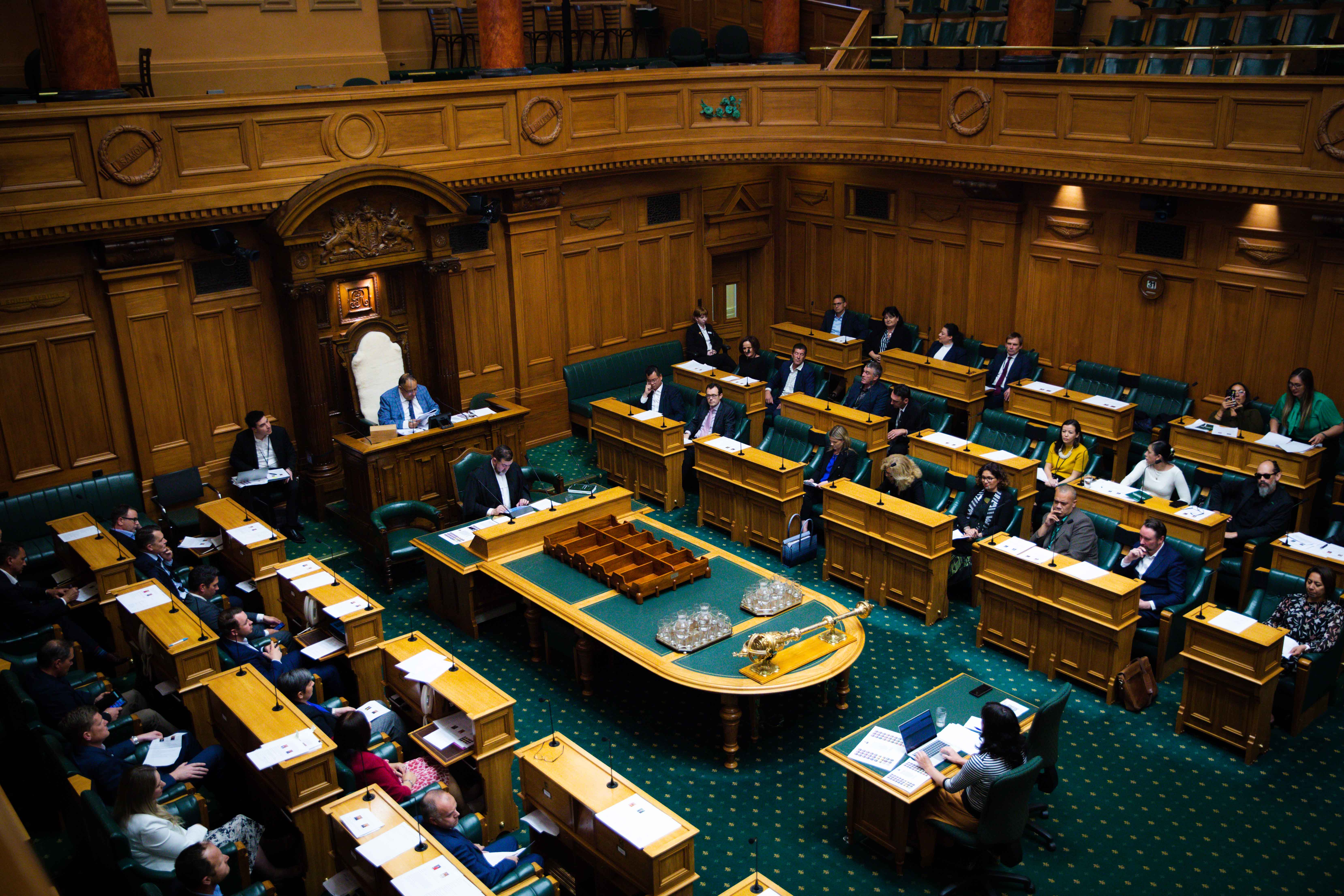 Newly-elected members of the New Zealand Parliament participate in a role playing exercise simulating ministerial question time, chaired by the Rt Hon. Adrian Rurawhe MP, who was then Speaker of the House of Representatives.