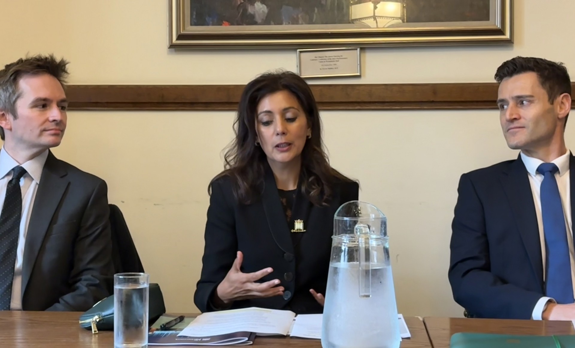 Nusrat Ghani MP sat behind a table with Mark Sewards MP and Dr Luke Evans MP in conversation on AI.
