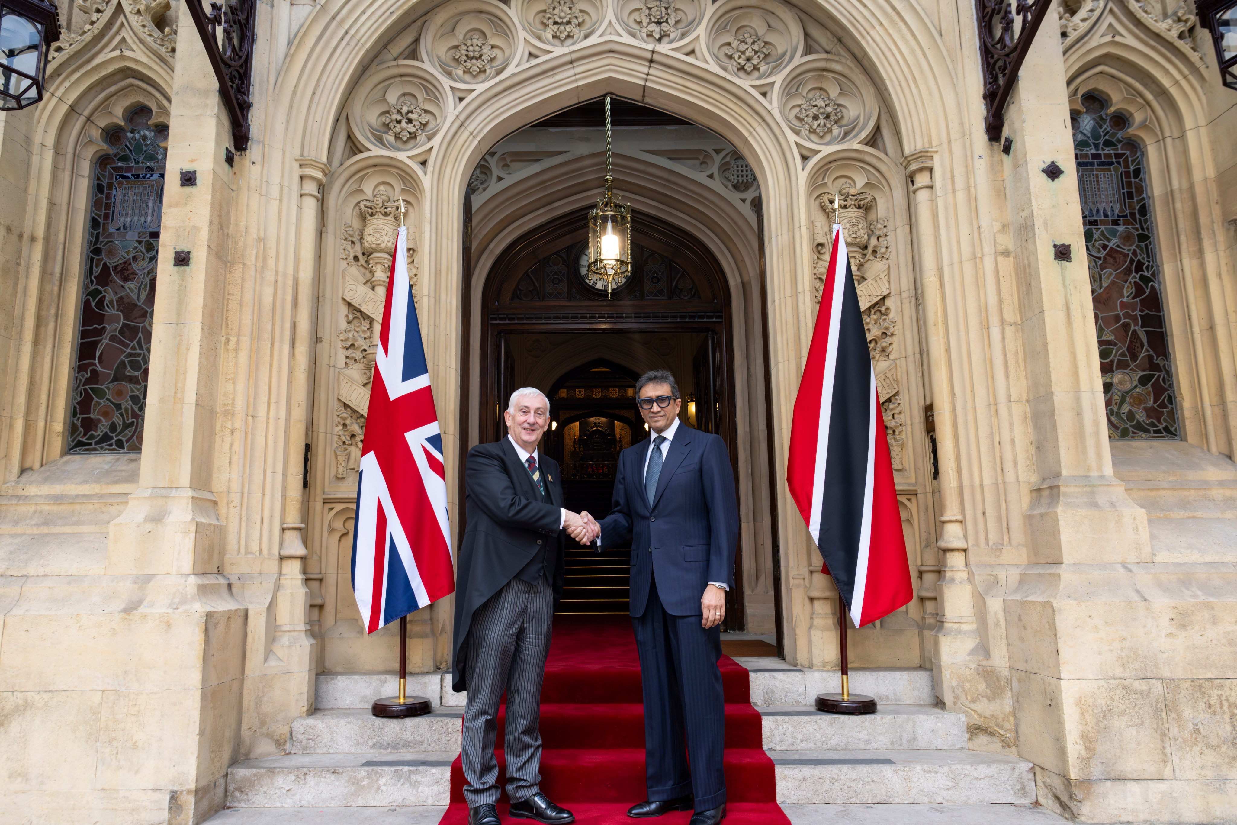 The Speaker of the UK House of Commons shakes hands with the Speaker of the House of Representatives of Trinidad and Tobago
